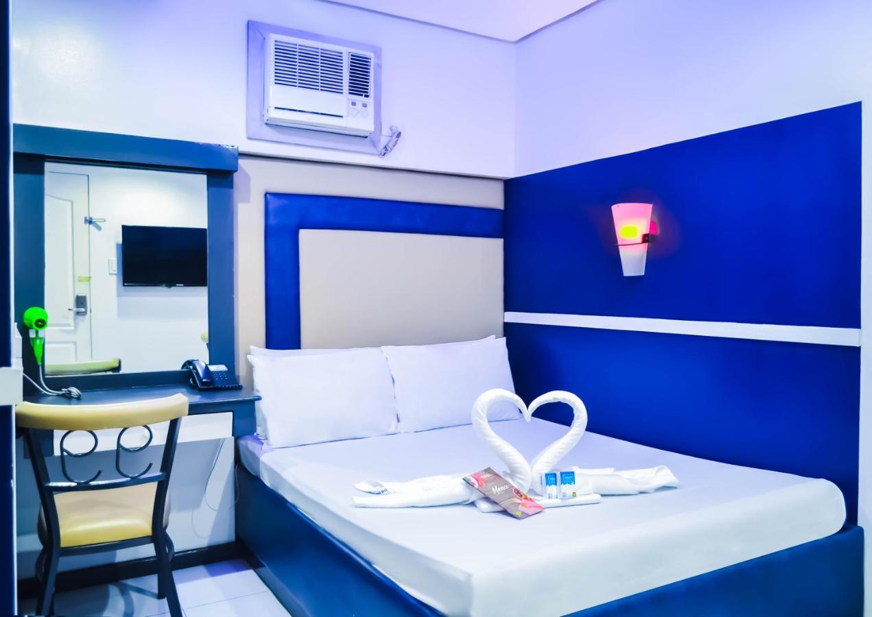 Hotel 99 Cubao Кесон-Сити Экстерьер фото