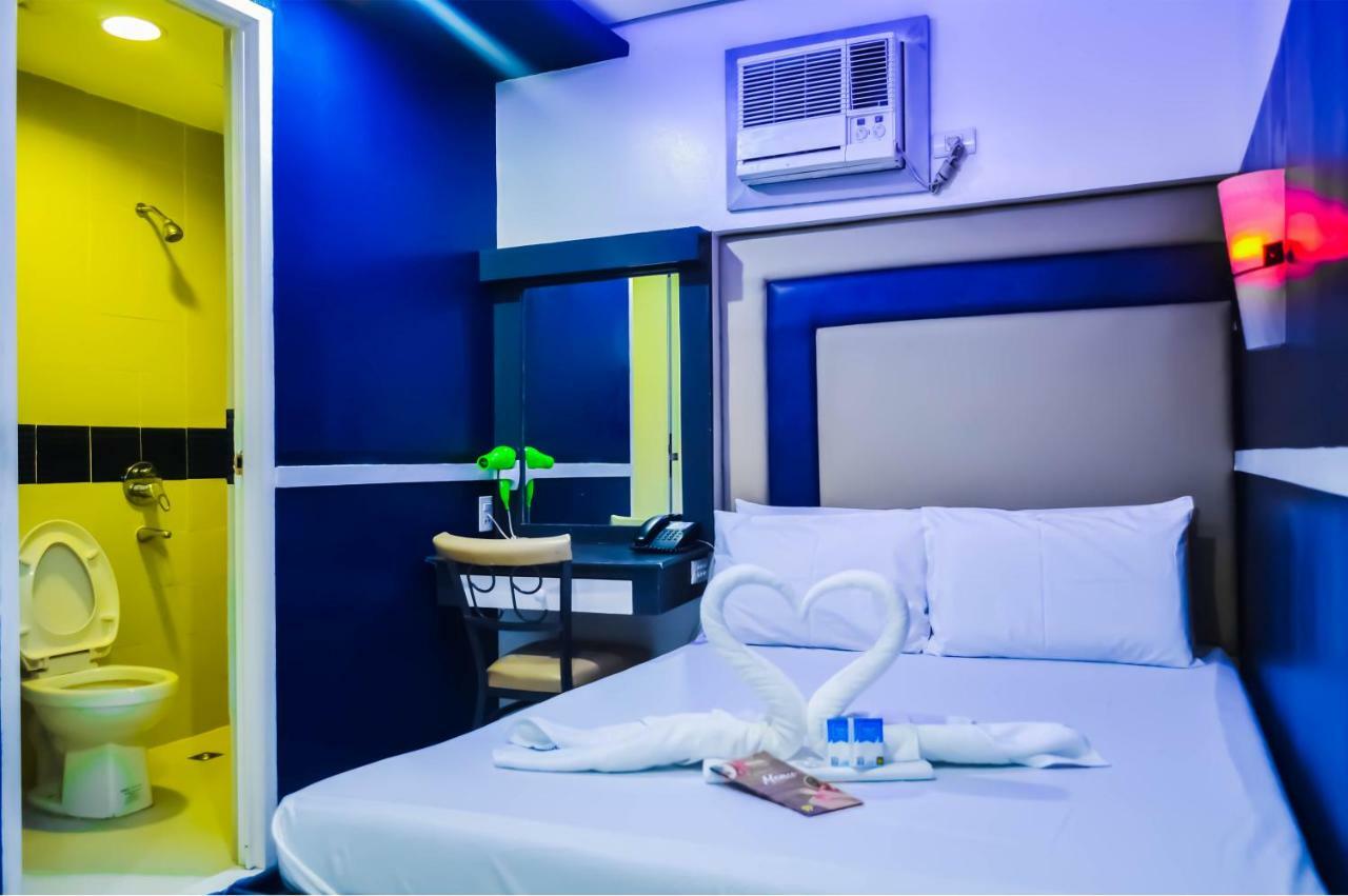 Hotel 99 Cubao Кесон-Сити Экстерьер фото